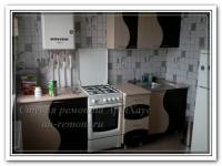 Ремонт помещения кухни с черно белой мебелью
