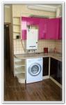 Ремонт помещения кухни с розовыми шкафчиками
