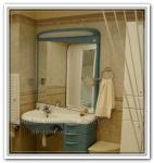 Ремонт помещения ванной с большим зеркалом