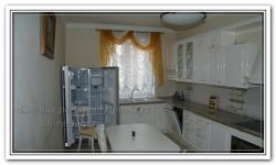 Ремонт дома на белой кухне